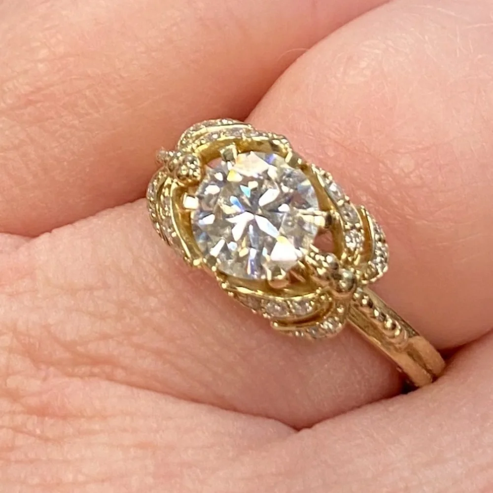 10kt yellow gold and moissanite dragonfly ring.
